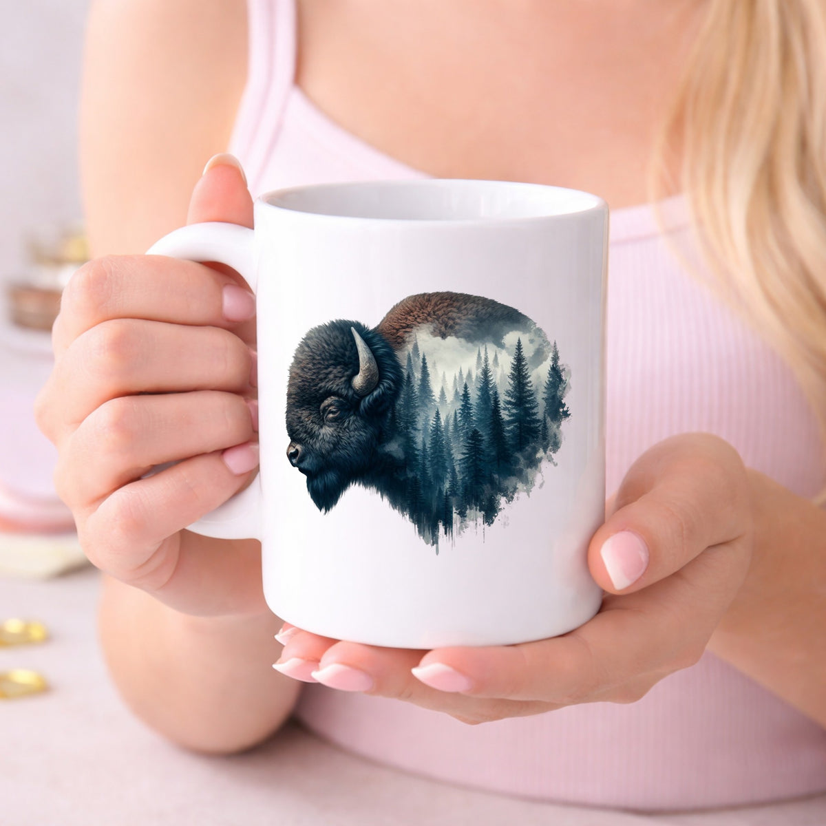 Dark Blue Bison UV DTF sticker applied to a white coffee mug held in both hands