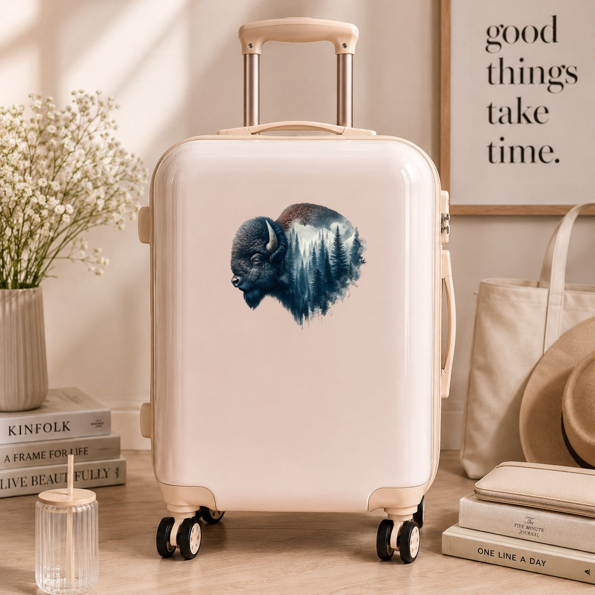 Dark Blue Bison UV DTF sticker applied to a cream carry-on suitcase