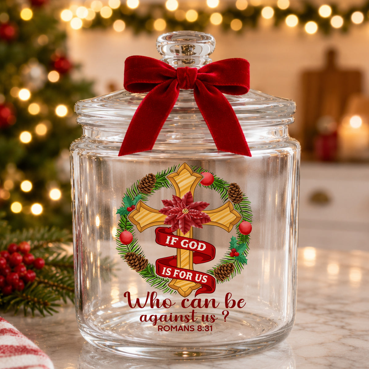 If God Is For Us Christmas Cross UV DTF sticker applied to a glass candy jar tied with a red bow