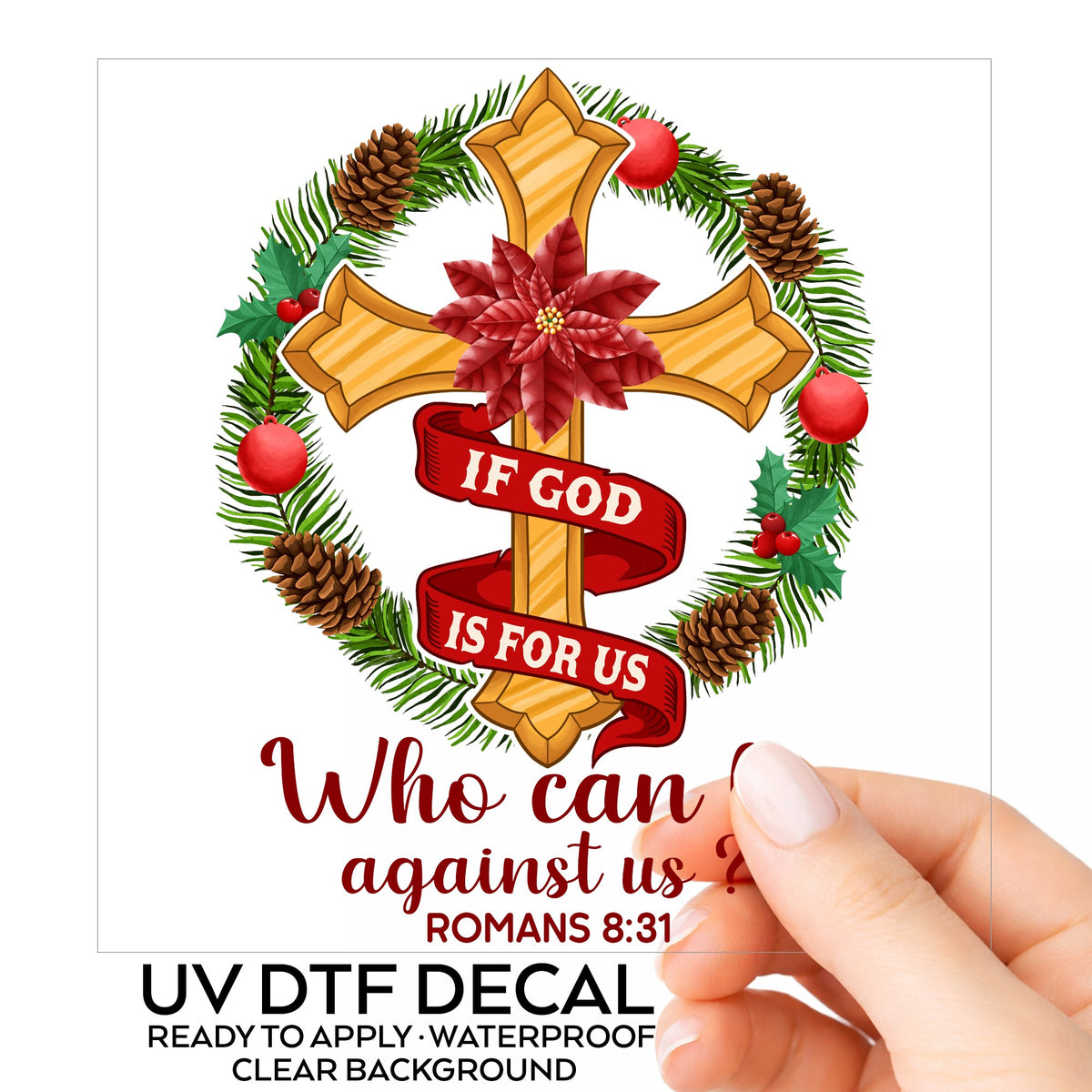 If God Is For Us Christmas Cross UV DTF sticker on its backing card, held in hand