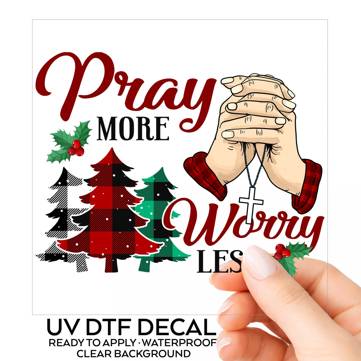 Pray More Worry Less Praying Hands UV DTF sticker on its backing card, held in hand