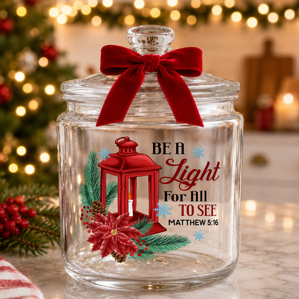 Be A Light Christmas Lantern UV DTF sticker applied to a glass candy jar tied with a red bow