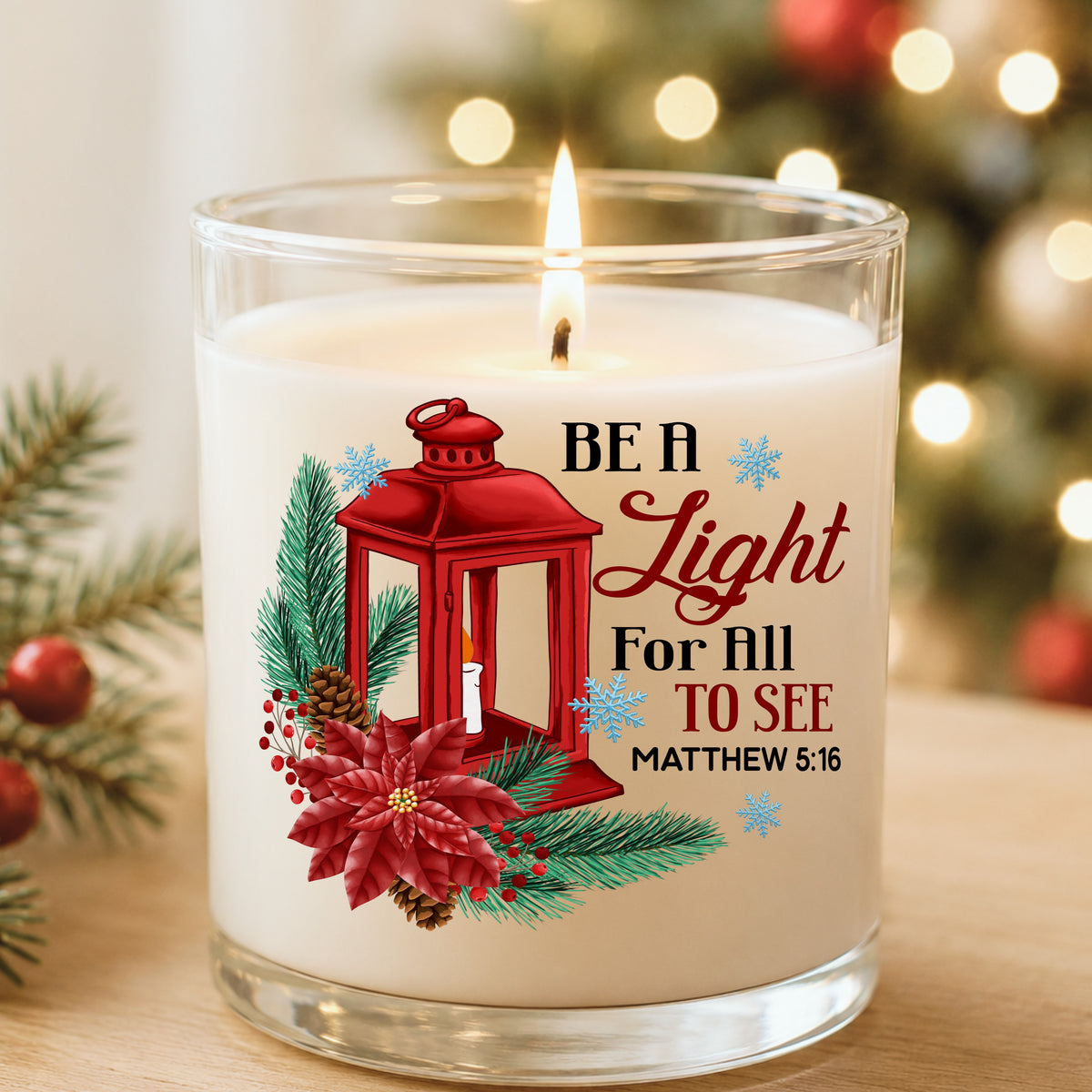 Be A Light Christmas Lantern UV DTF sticker applied to a white candle in a glass holder near Christmas lights