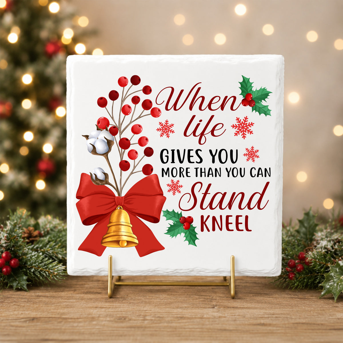 Kneel Faith Quote Red Bow UV DTF sticker applied to a white tile on a gold stand