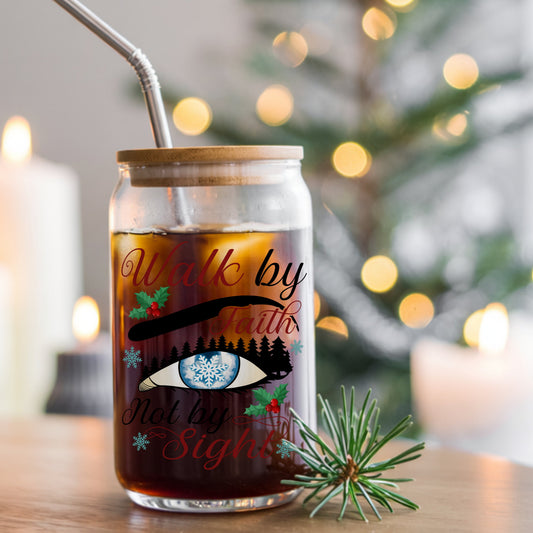 Walk By Faith Snowflake Eye UV DTF sticker applied to a glass can cup of iced coffee with a straw
