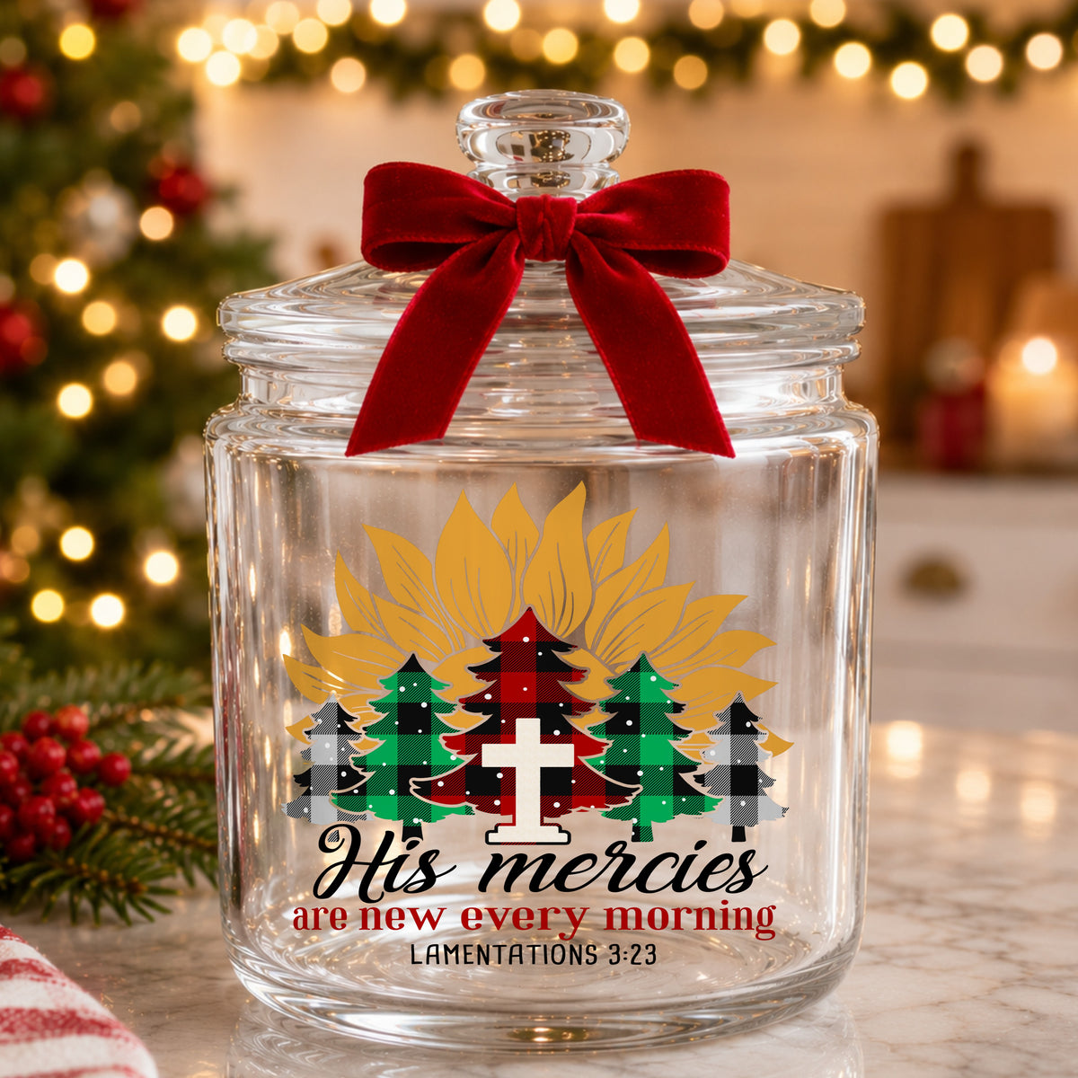 His Mercies Sunflower Christmas Tree UV DTF sticker applied to a glass candy jar tied with a red bow