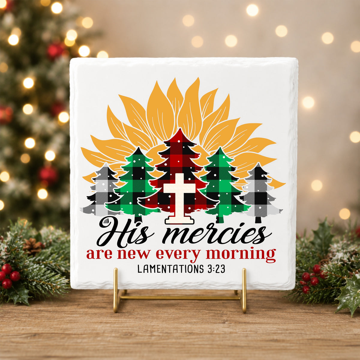 His Mercies Sunflower Christmas Tree UV DTF sticker applied to a white tile on a gold stand