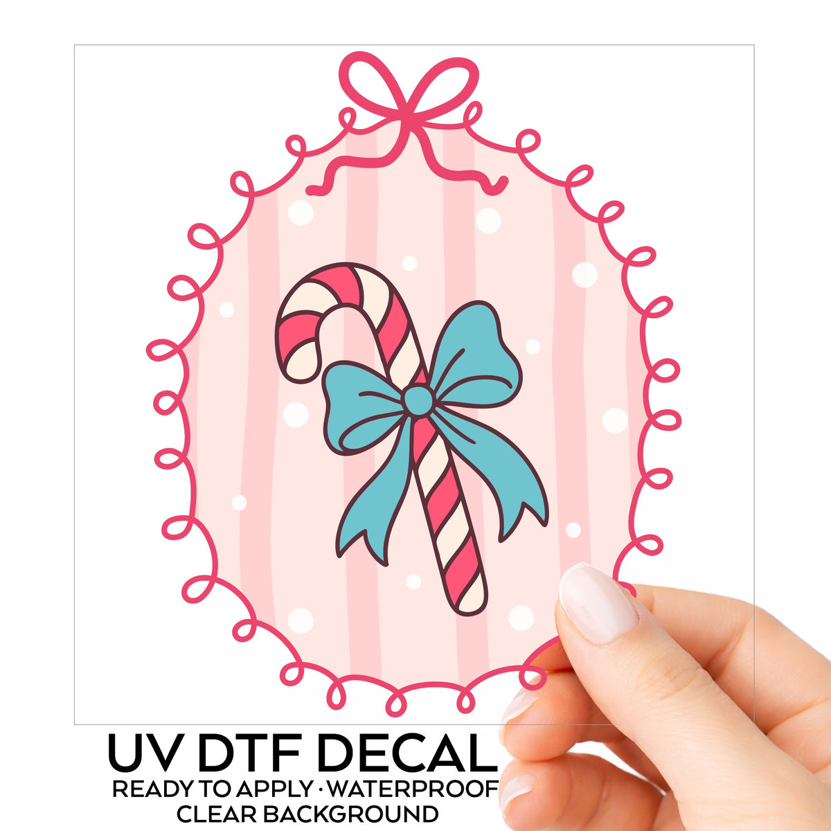 Coquette Candy Cane UV DTF sticker on its backing card, held in hand