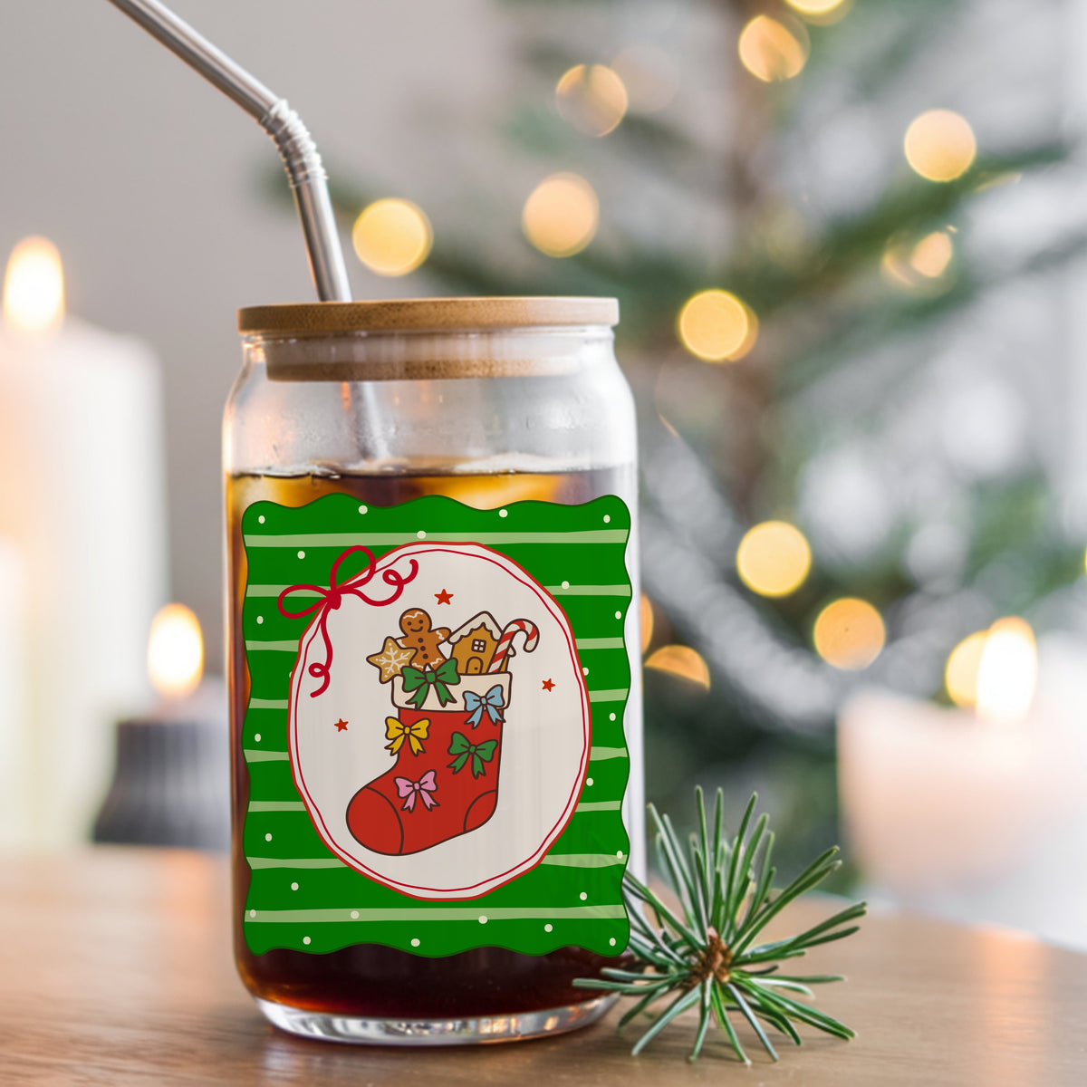 Coquette Gingerbread Stocking UV DTF sticker applied to a glass can cup of iced coffee with a straw