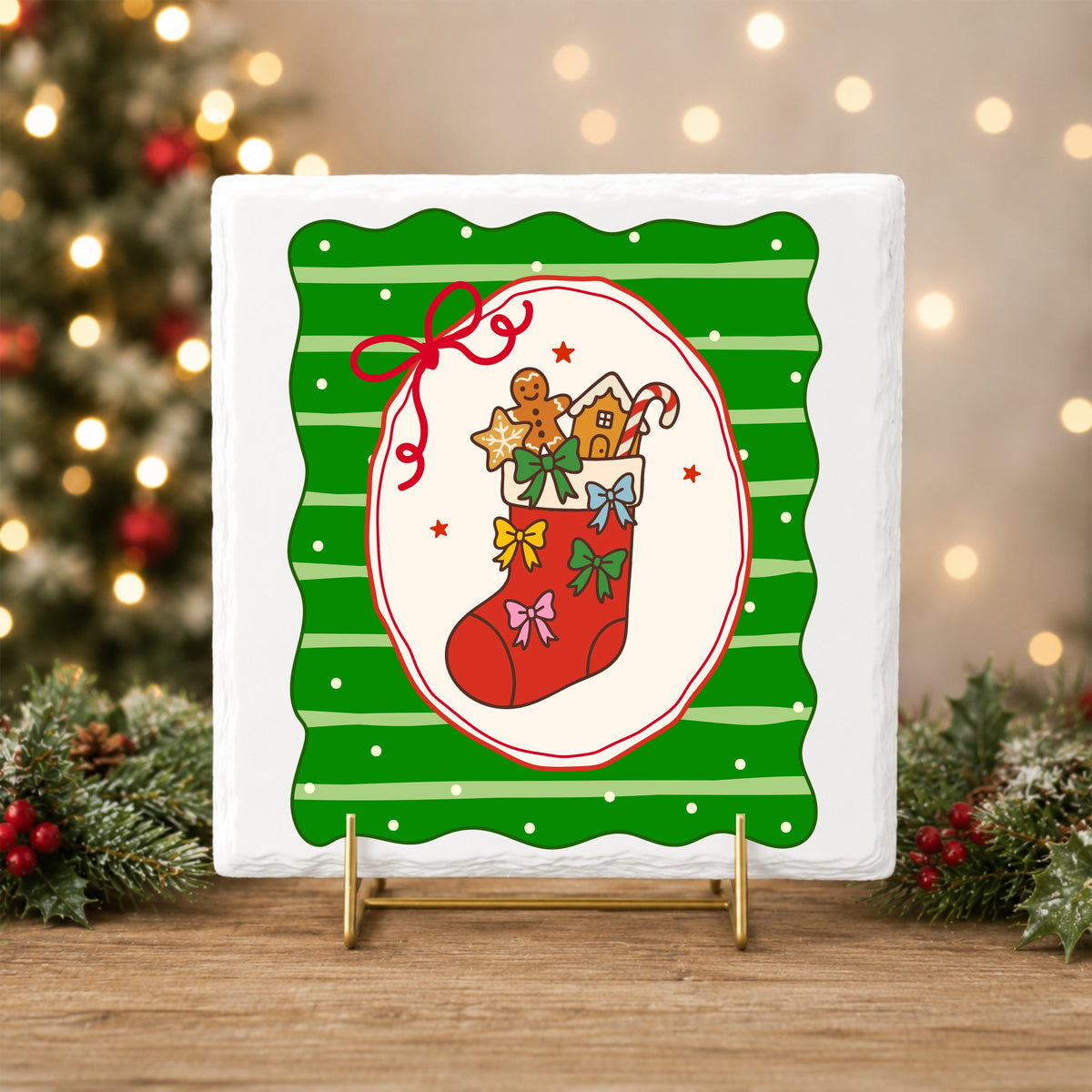 Coquette Gingerbread Stocking UV DTF sticker applied to a white tile on a gold stand
