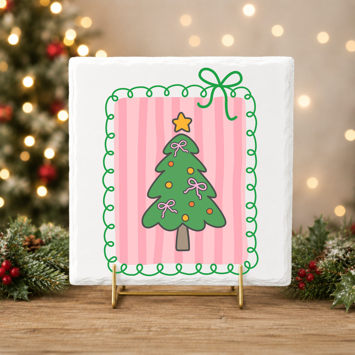 Coquette Pink Bow Christmas Tree UV DTF sticker applied to a white tile on a gold stand