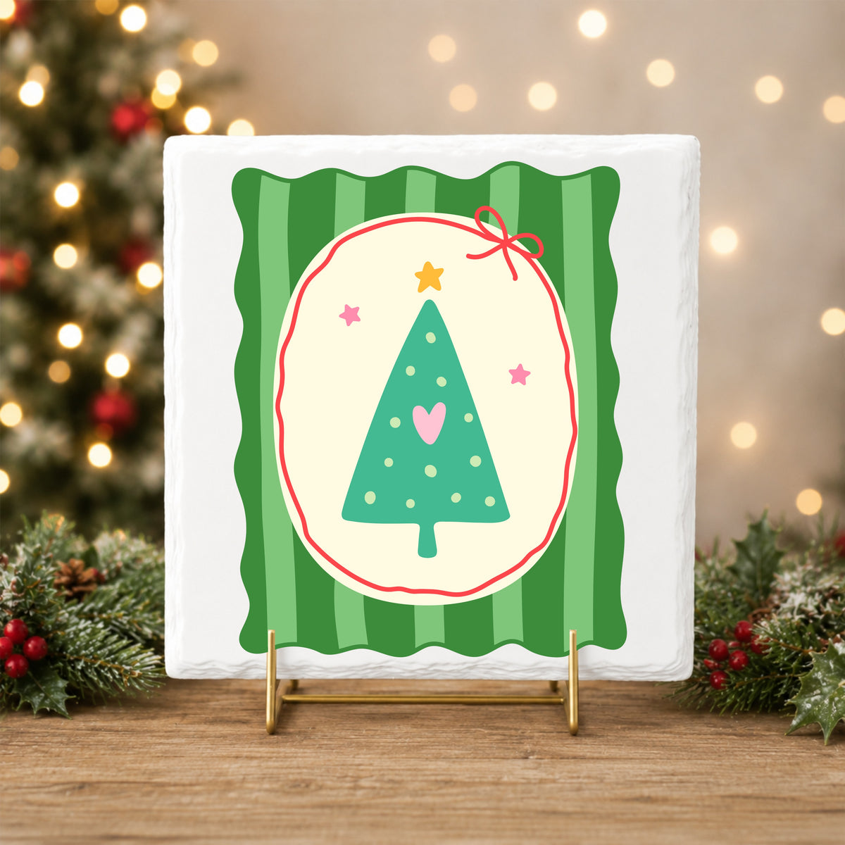 Coquette Teal Heart Christmas Tree UV DTF sticker applied to a white tile on a gold stand