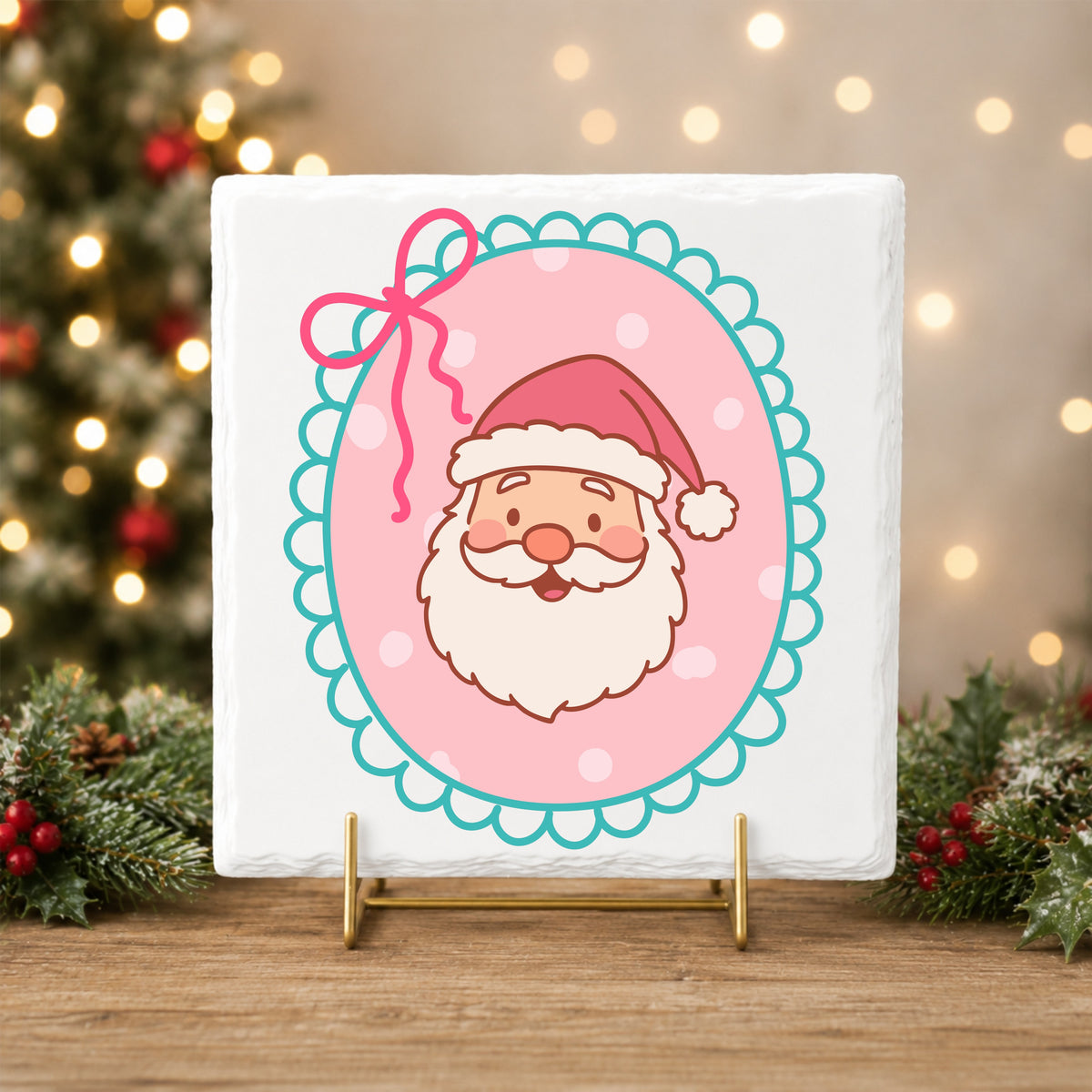 Coquette Pink Santa Claus Face UV DTF sticker applied to a white tile on a gold stand