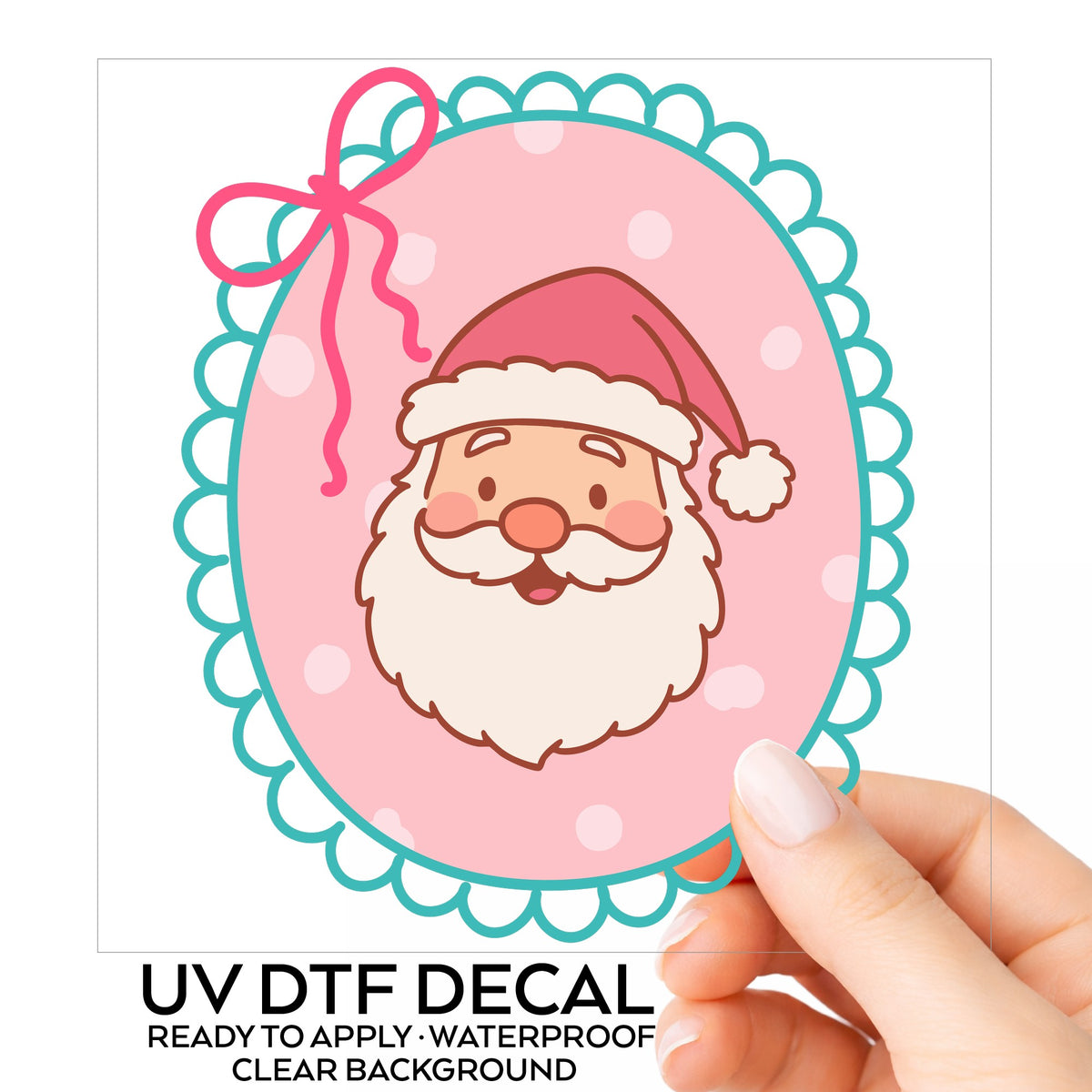 Coquette Pink Santa Claus Face UV DTF sticker on its backing card, held in hand