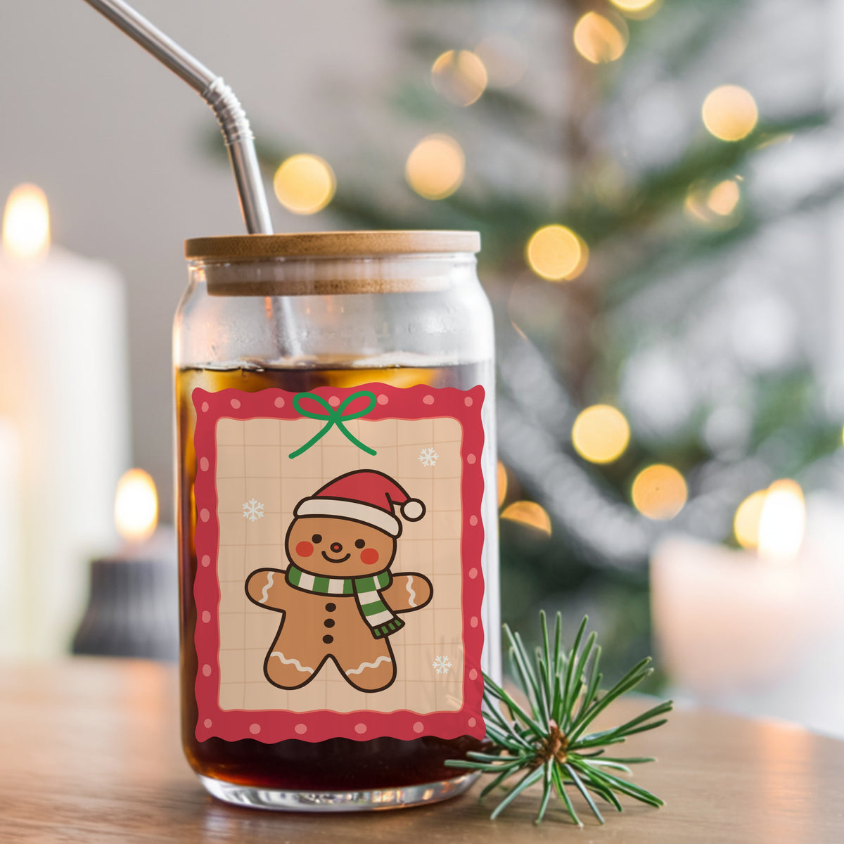 Coquette Gingerbread Man UV DTF sticker applied to a glass can cup of iced coffee with a straw
