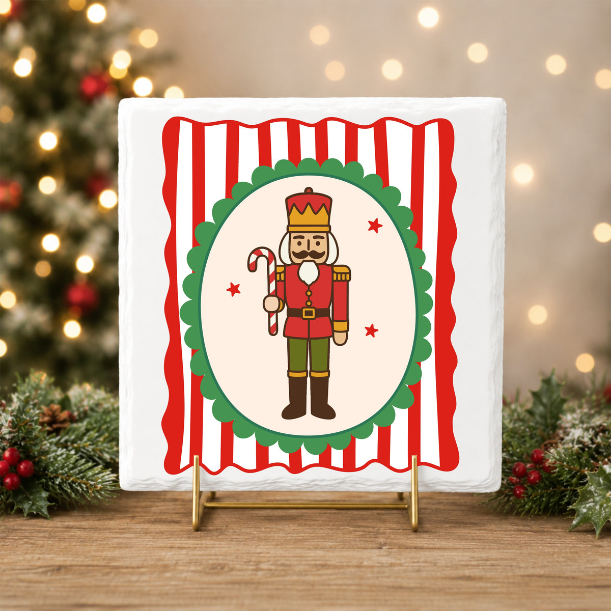 Coquette Nutcracker Soldier UV DTF sticker applied to a white tile on a gold stand