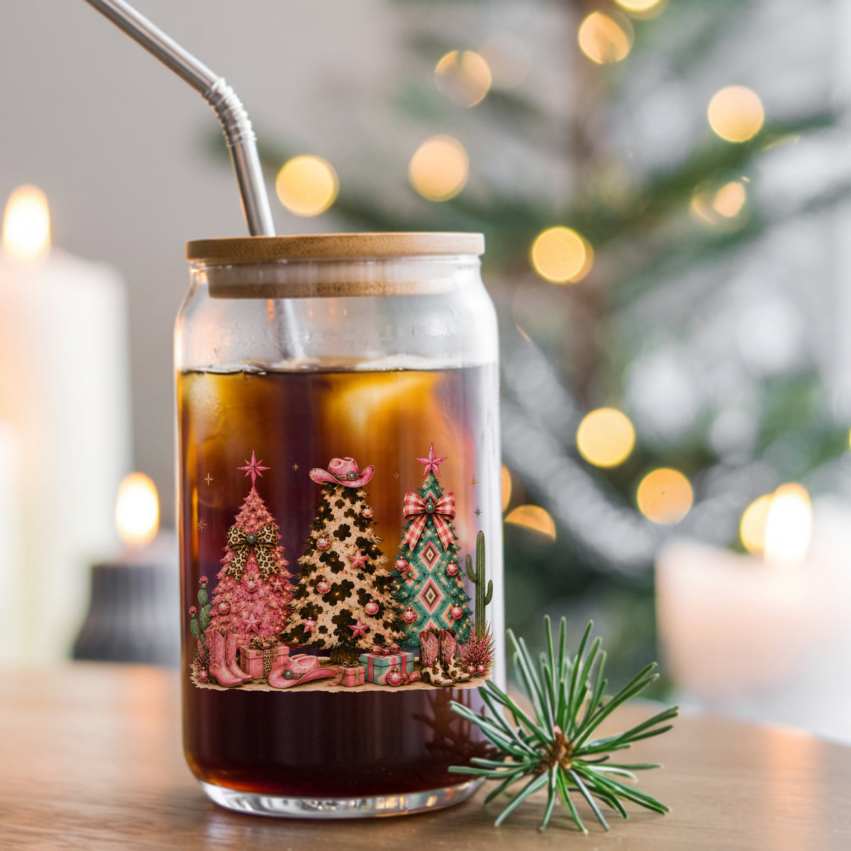 Western Leopard Christmas Trees UV DTF sticker applied to a glass can cup of iced coffee with a straw