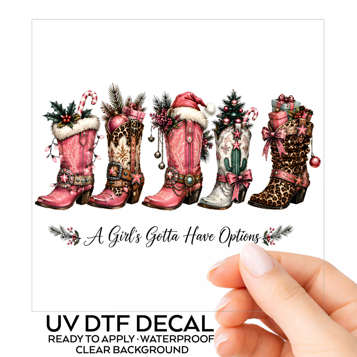 A Girls Gotta Have Options Christmas Boots UV DTF sticker on its backing card, held in hand