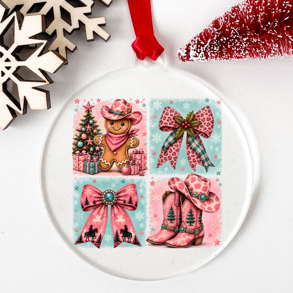 Western Gingerbread Cowgirl Panels UV DTF sticker applied to a clear round acrylic ornament with a red ribbon