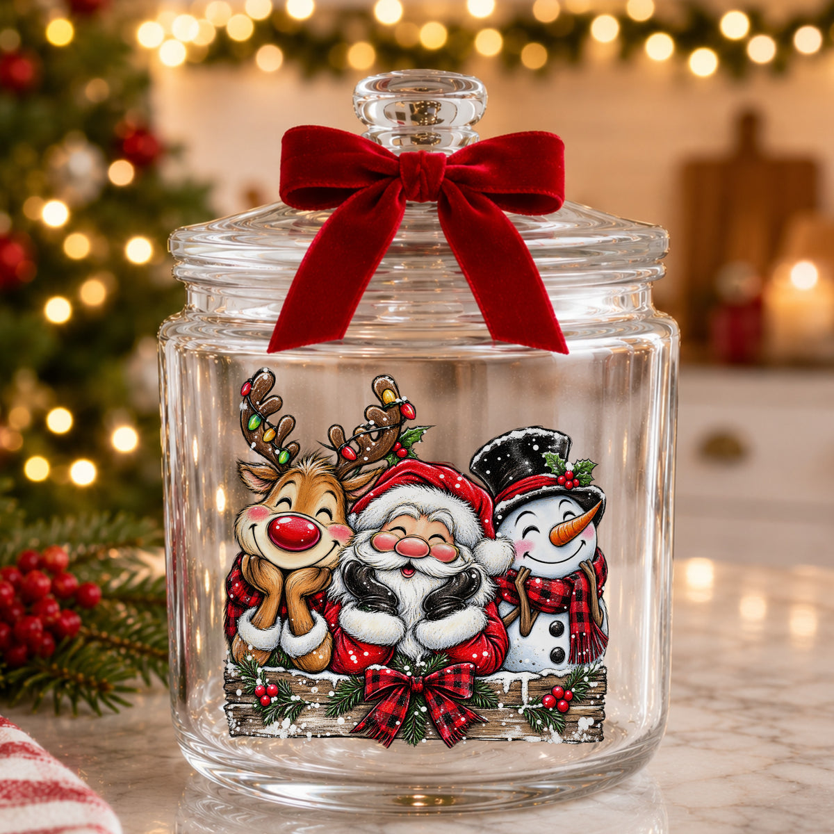 Santa Reindeer Snowman Plaid Bow UV DTF sticker applied to a glass candy jar tied with a red bow
