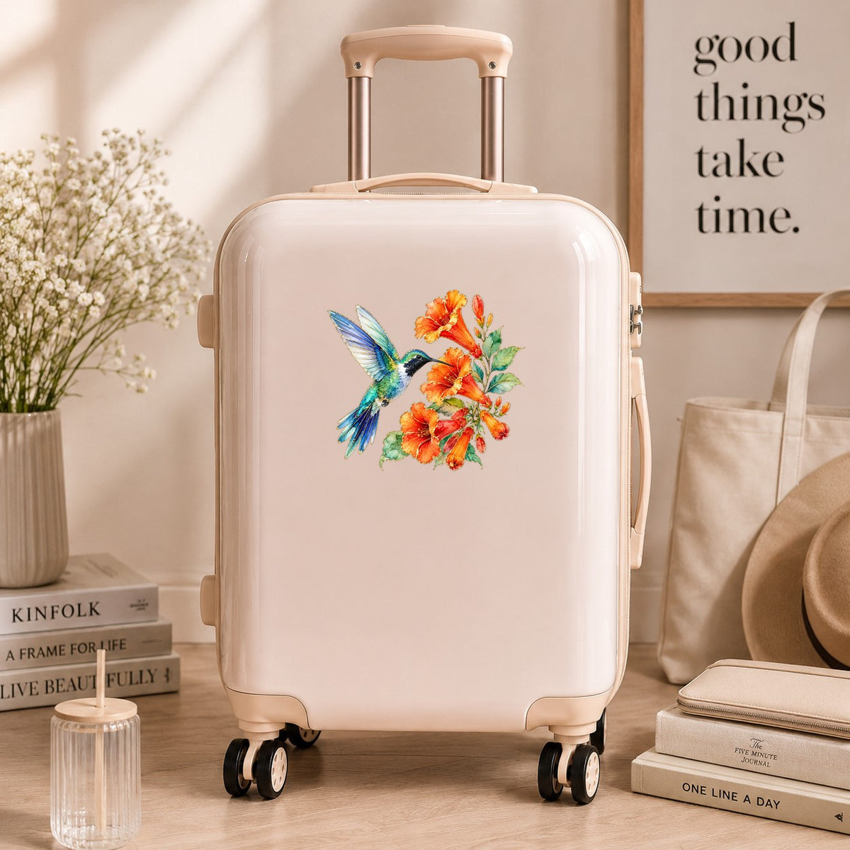 Blue Hummingbird Trumpet Flowers UV DTF sticker applied to a cream carry-on suitcase
