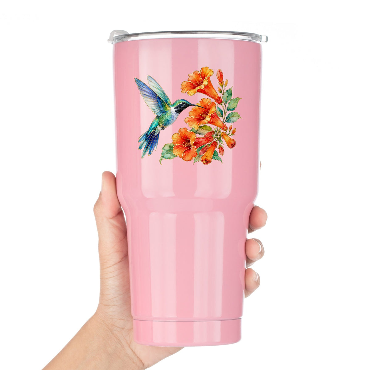 Blue Hummingbird Trumpet Flowers UV DTF sticker applied to a pink tumbler held against a white background