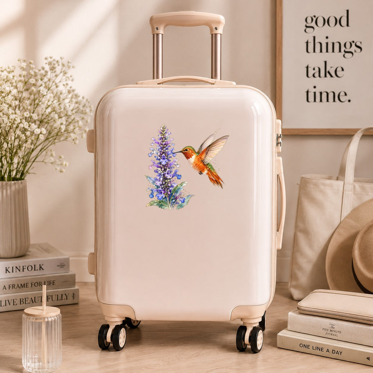 Rufous Hummingbird Purple Flowers UV DTF sticker applied to a cream carry-on suitcase