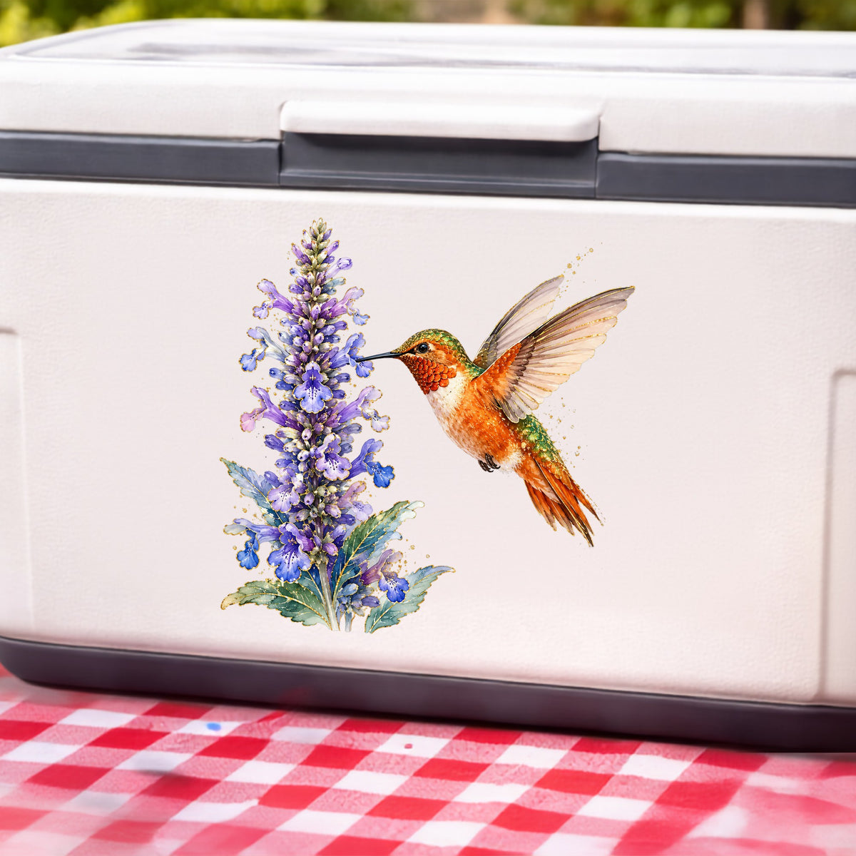 Rufous Hummingbird Purple Flowers UV DTF sticker applied to a white cooler on a red gingham cloth