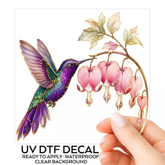 Purple Hummingbird Bleeding Heart UV DTF sticker on its backing card, held in hand