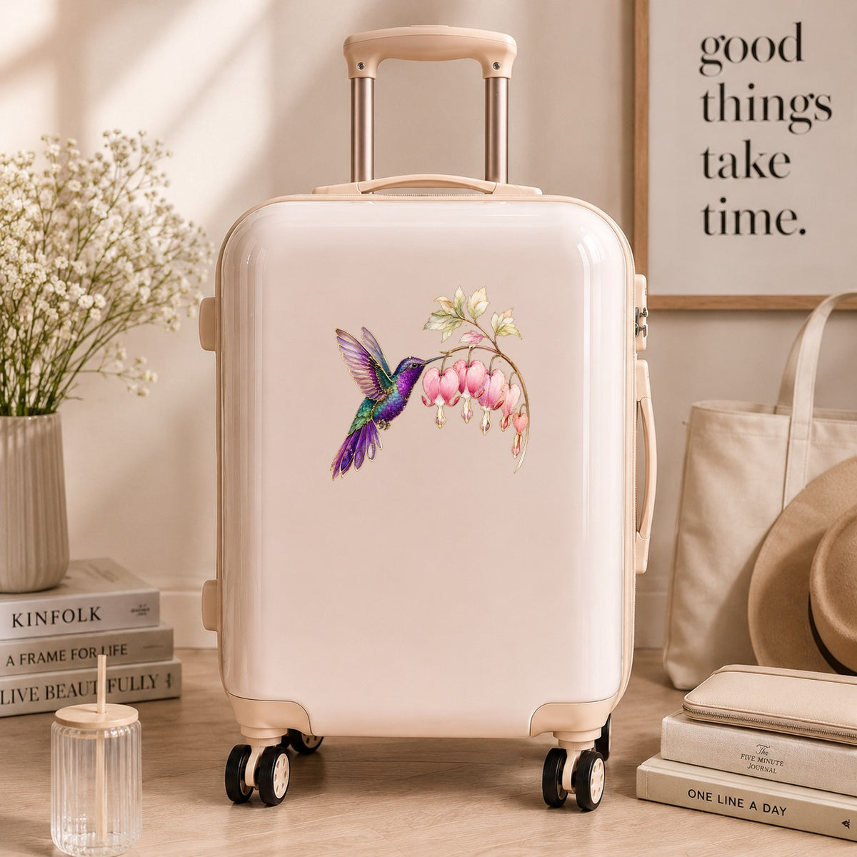 Purple Hummingbird Bleeding Heart UV DTF sticker applied to a cream carry-on suitcase