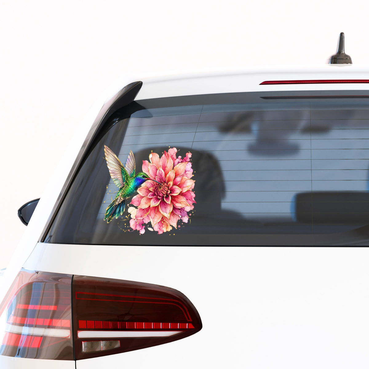 Hummingbird Pink Dahlia UV DTF sticker applied to the rear window of a white car