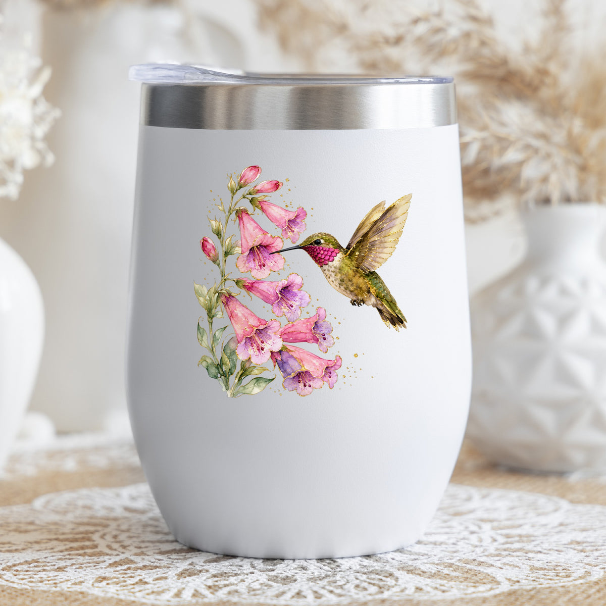 Ruby Throated Hummingbird Pink Bells UV DTF sticker applied to a white stemless tumbler with a lid
