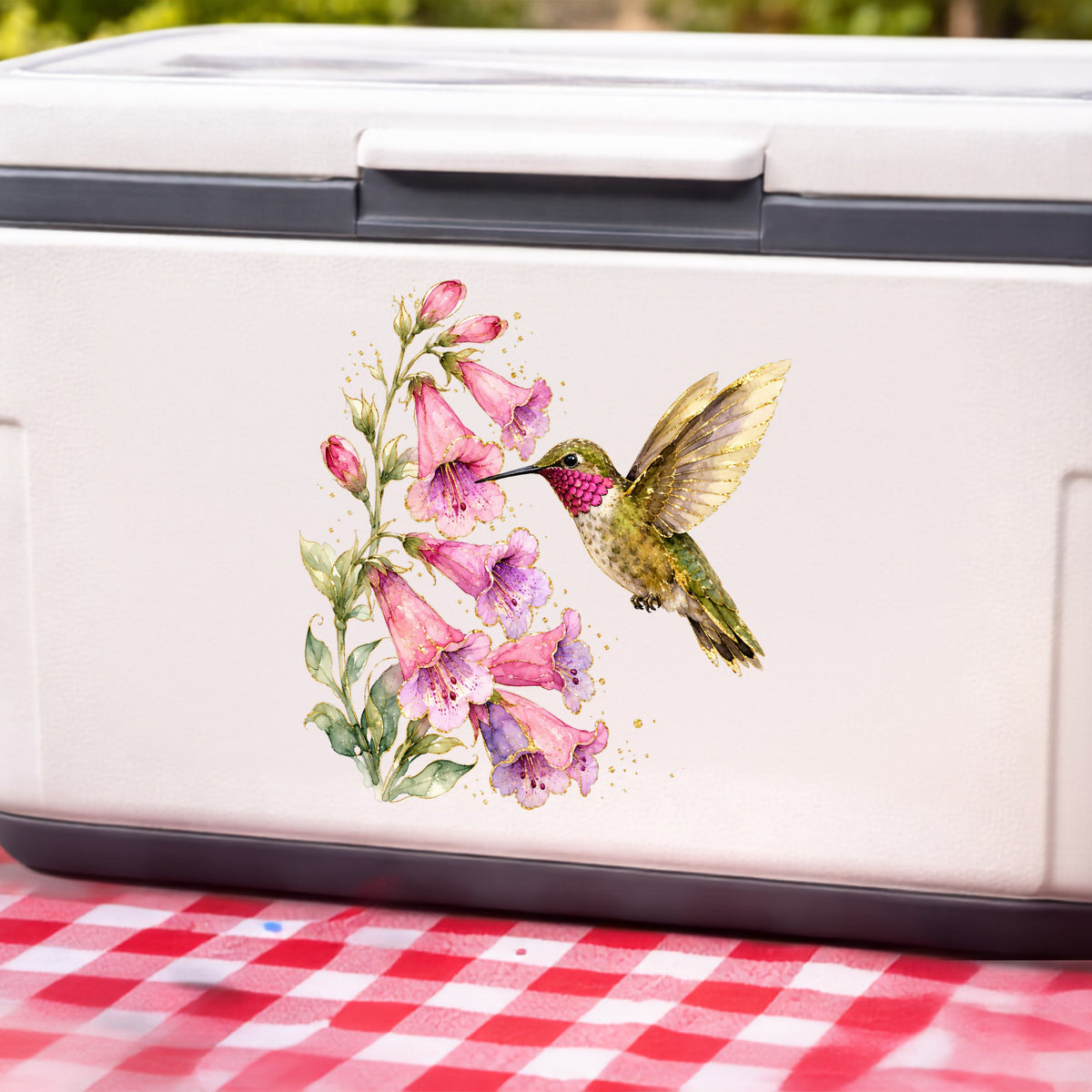 Ruby Throated Hummingbird Pink Bells UV DTF sticker applied to a white cooler on a red gingham cloth