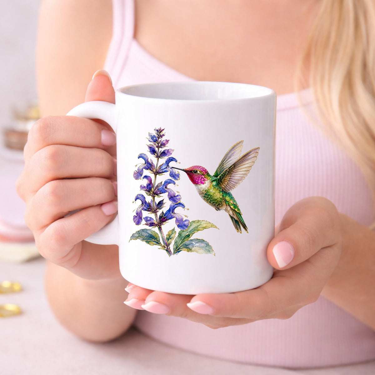 Hummingbird Purple Salvia UV DTF sticker applied to a white coffee mug held in both hands