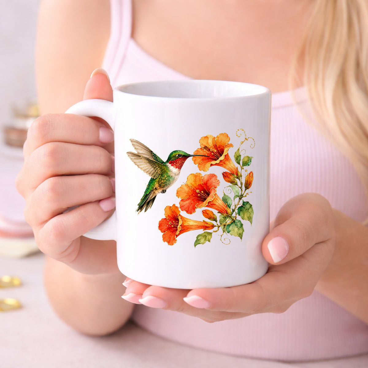 Red Throat Hummingbird Trumpet Flowers UV DTF sticker applied to a white coffee mug held in both hands