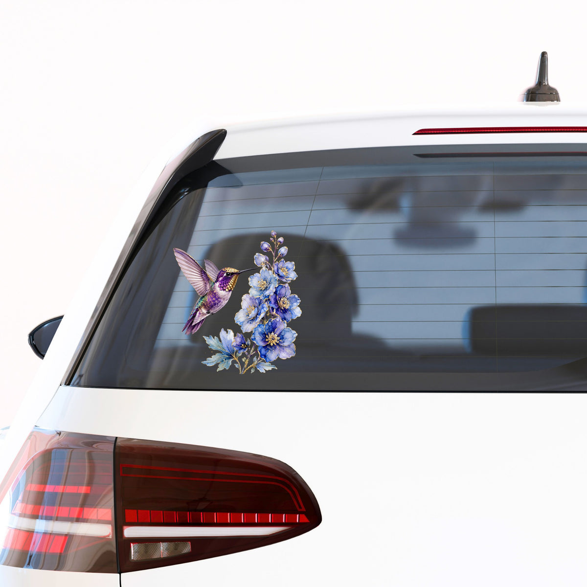 Purple Hummingbird Blue Delphinium UV DTF sticker applied to the rear window of a white car