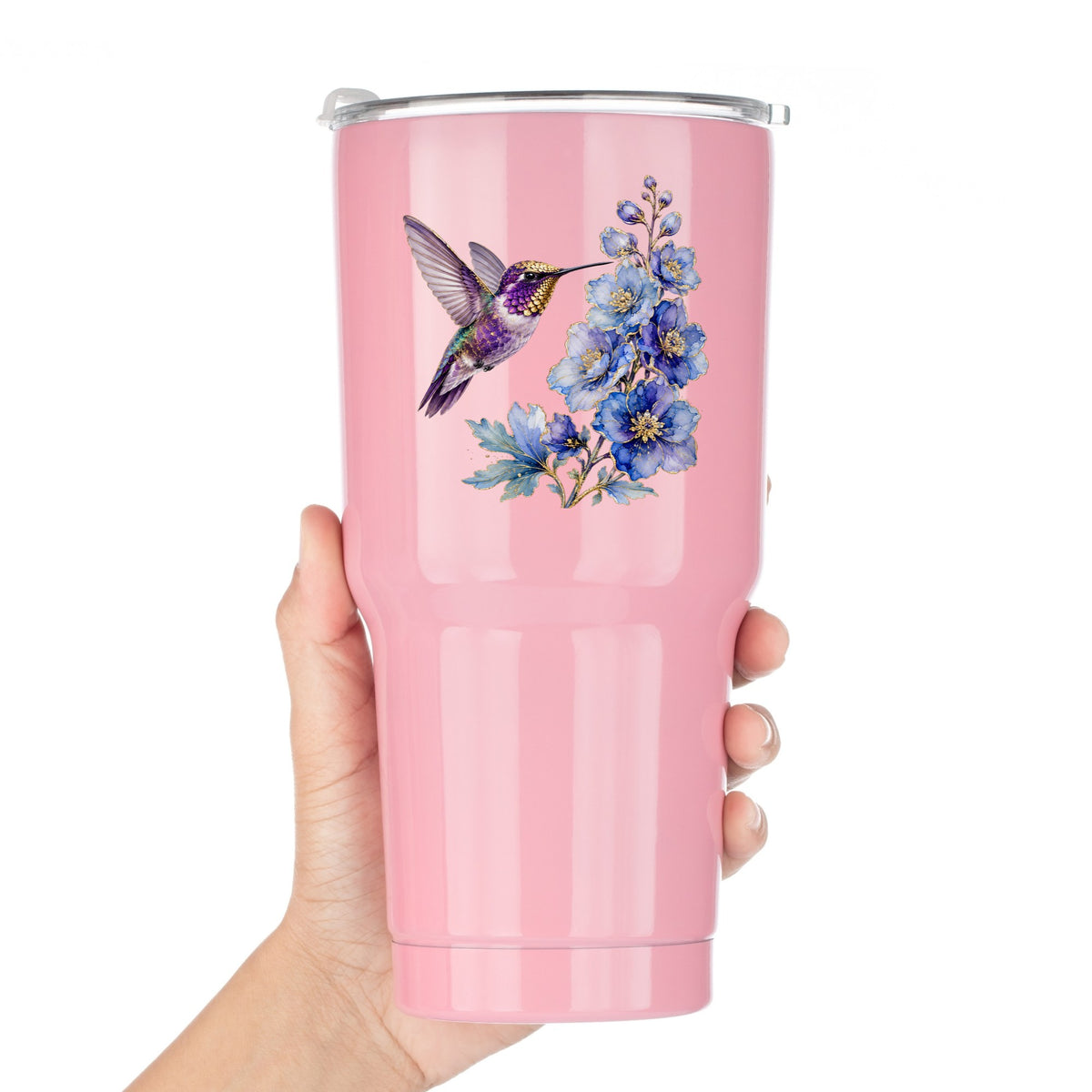 Purple Hummingbird Blue Delphinium UV DTF sticker applied to a pink tumbler held against a white background