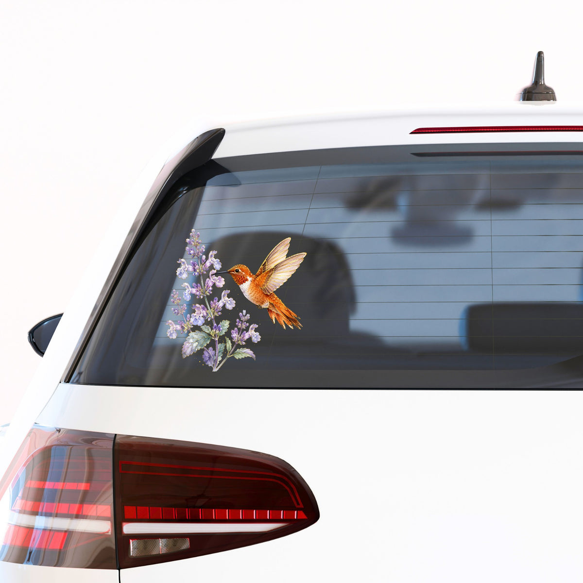 Rufous Hummingbird Lavender UV DTF sticker applied to the rear window of a white car
