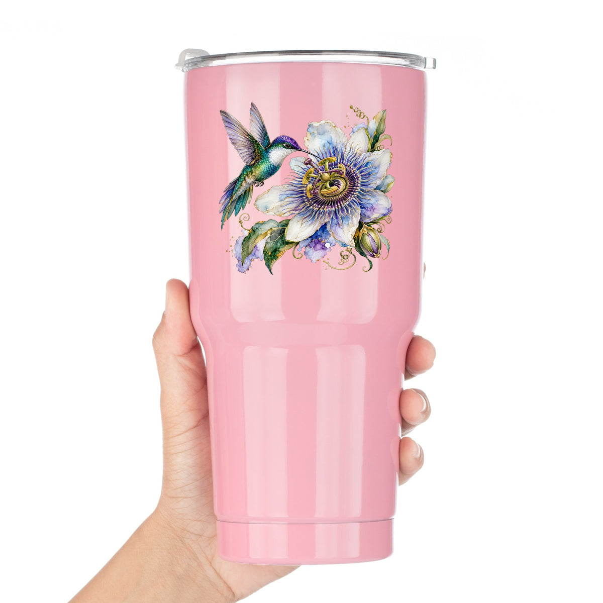 Hummingbird Passion Flower UV DTF sticker applied to a pink tumbler held against a white background