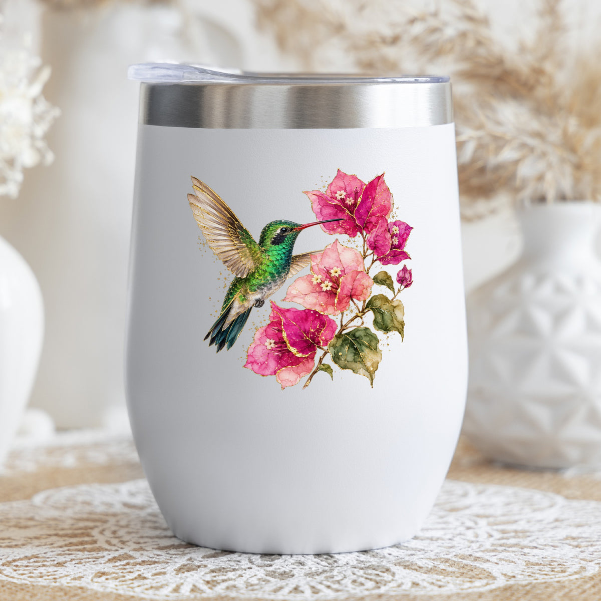 Hummingbird Pink Bougainvillea UV DTF sticker applied to a white stemless tumbler with a lid