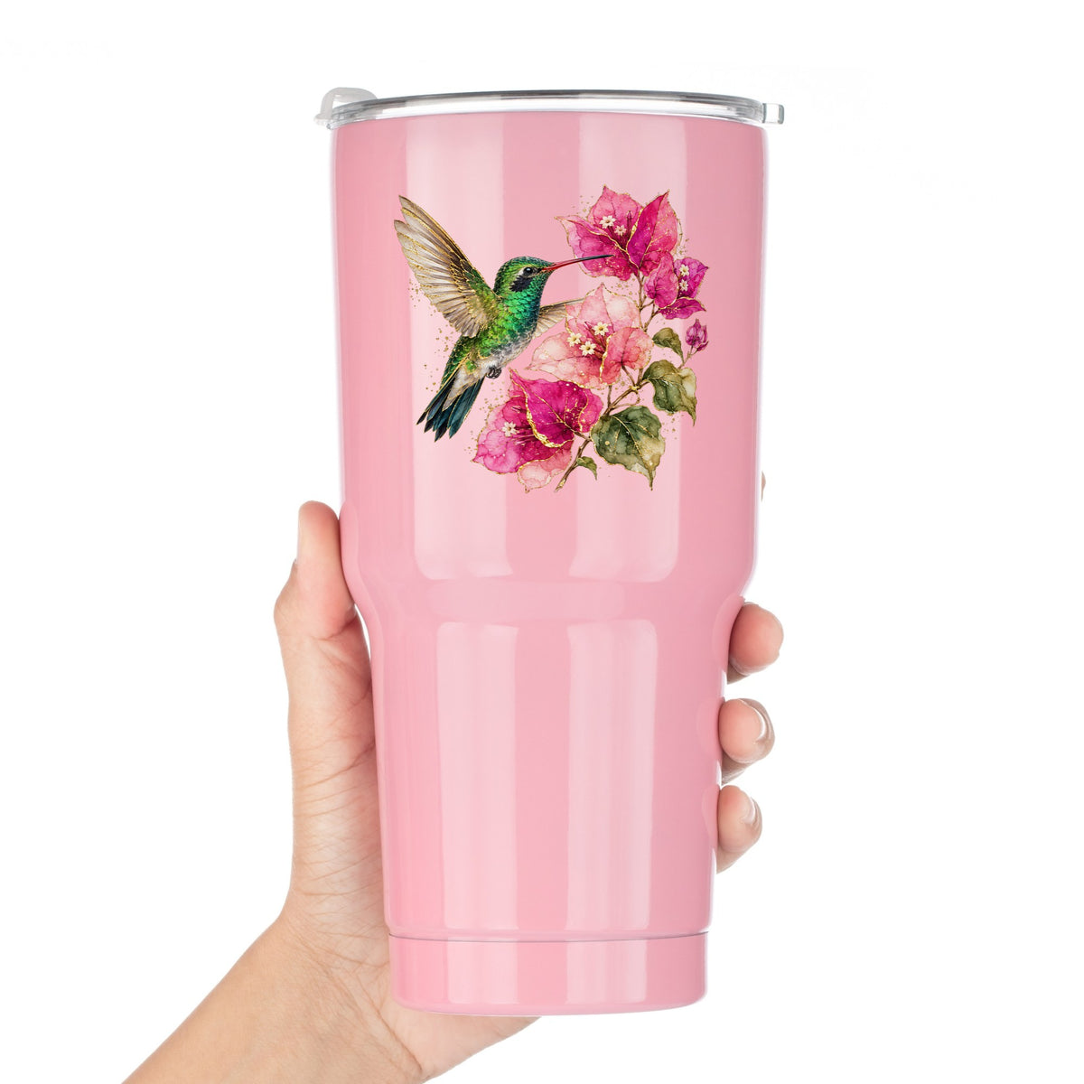 Hummingbird Pink Bougainvillea UV DTF sticker applied to a pink tumbler held against a white background