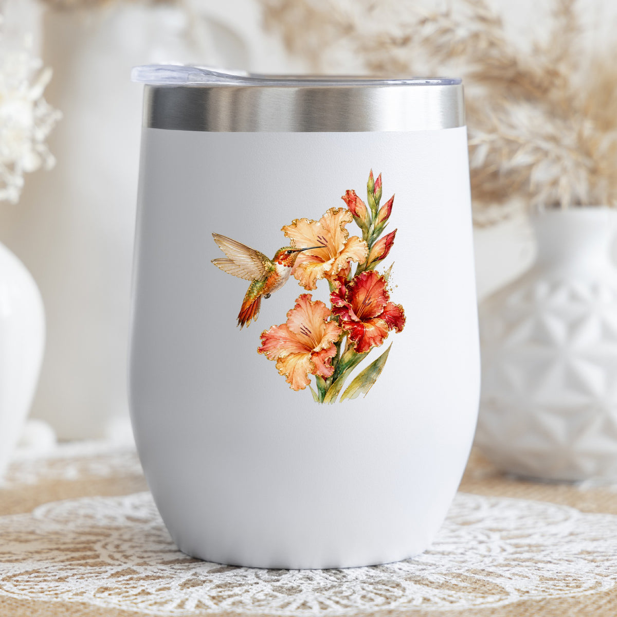 Hummingbird Peach Gladiolus UV DTF sticker applied to a white stemless tumbler with a lid