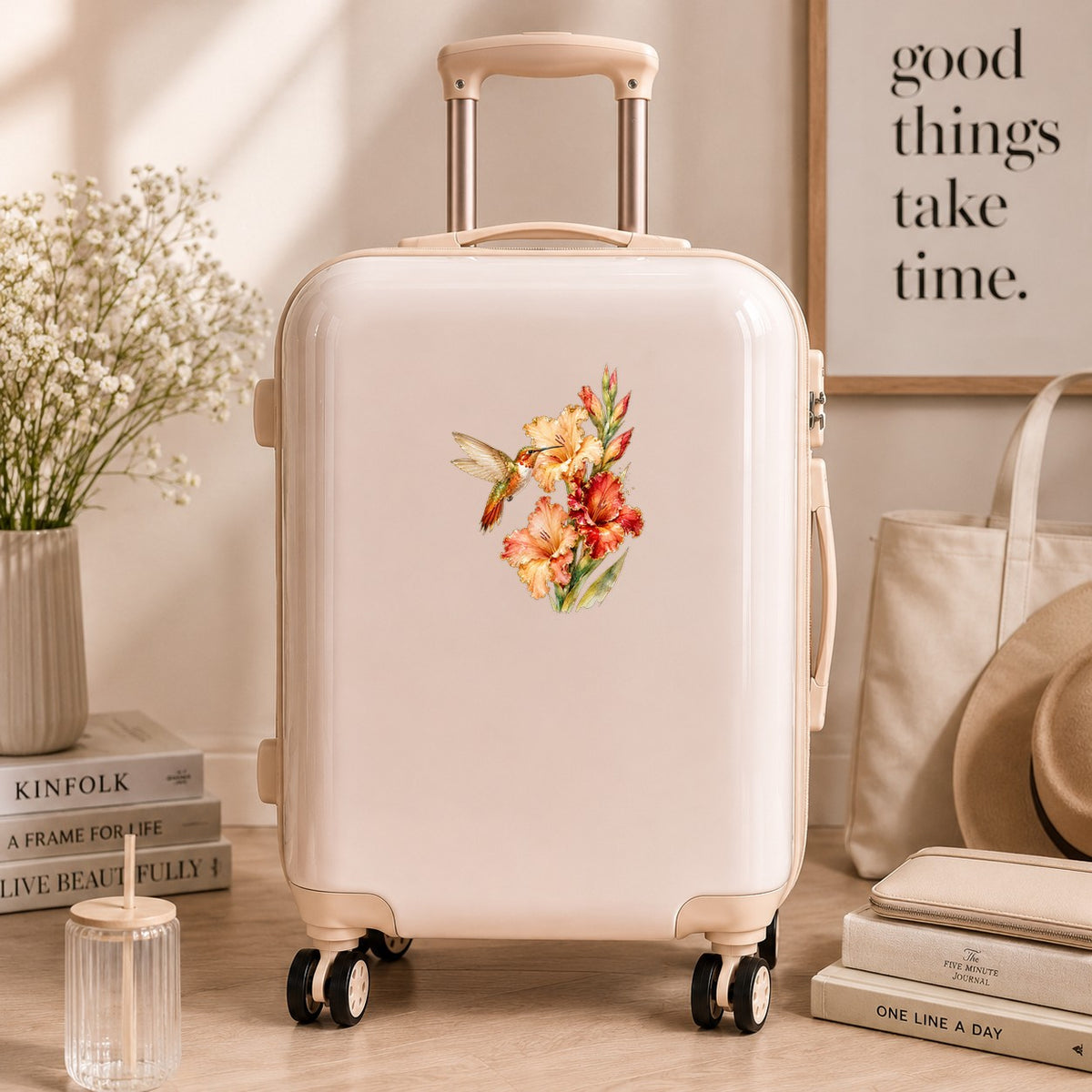 Hummingbird Peach Gladiolus UV DTF sticker applied to a cream carry-on suitcase