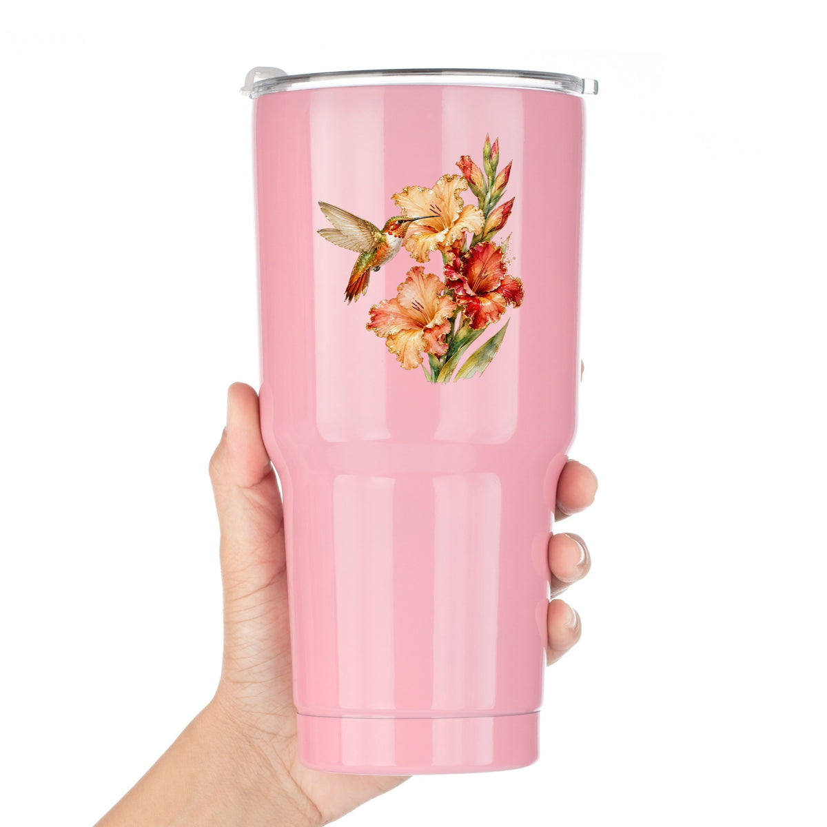 Hummingbird Peach Gladiolus UV DTF sticker applied to a pink tumbler held against a white background