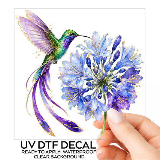 Hummingbird Blue Agapanthus UV DTF sticker on its backing card, held in hand