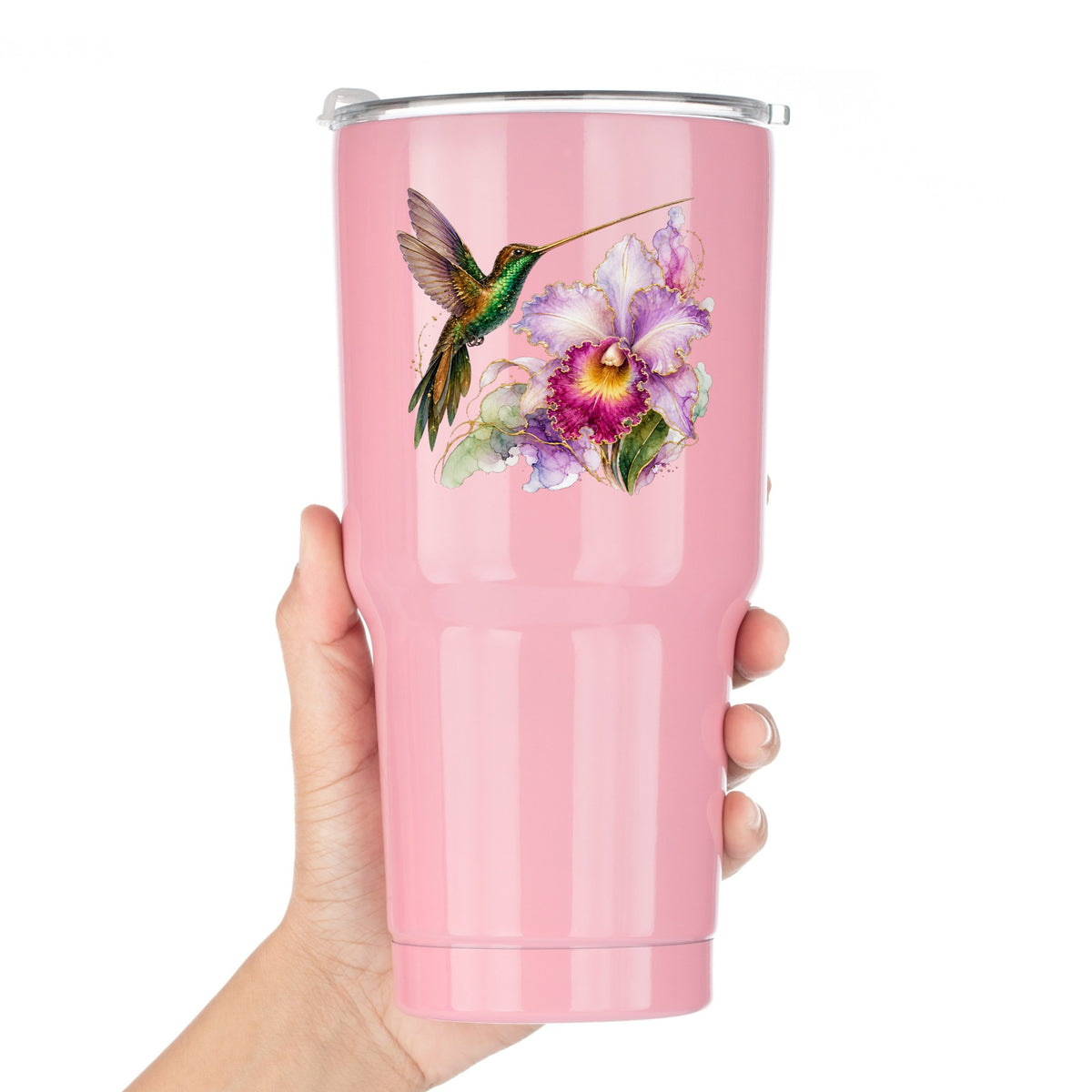 Hummingbird Purple Orchid UV DTF sticker applied to a pink tumbler held against a white background
