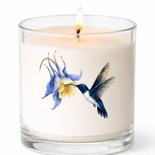 Navy Hummingbird Blue Columbine UV DTF sticker applied to a white candle in a clear glass jar