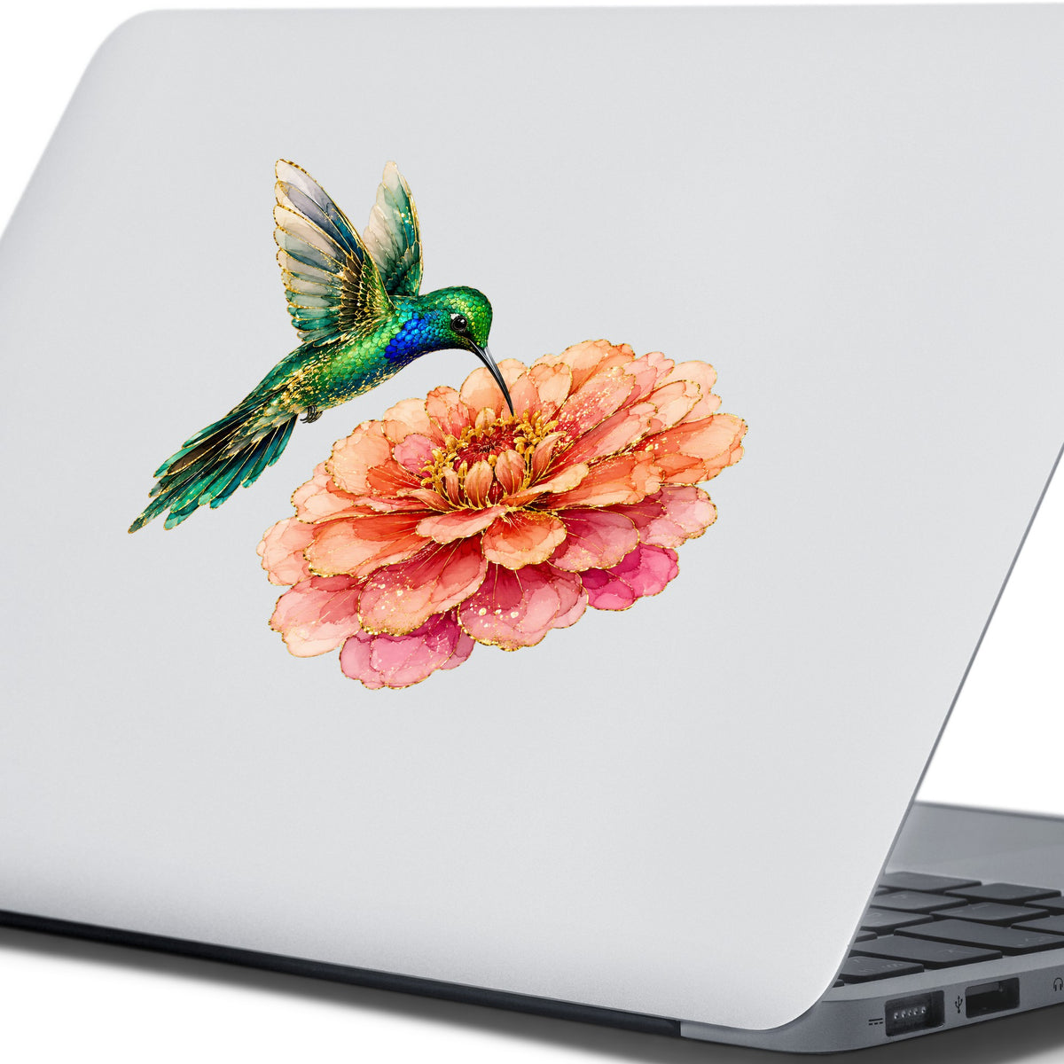 Hummingbird Coral Zinnia UV DTF sticker applied to the lid of a silver laptop
