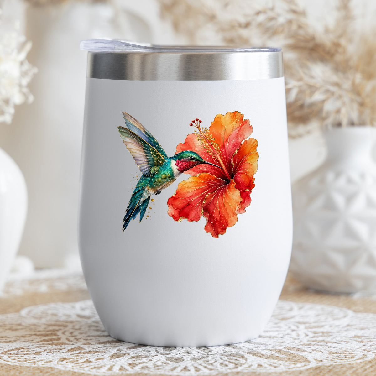 Hummingbird Red Hibiscus UV DTF sticker applied to a white stemless tumbler with a lid