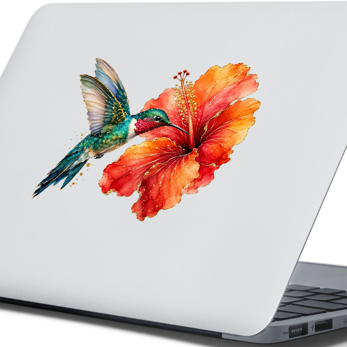 Hummingbird Red Hibiscus UV DTF sticker applied to the lid of a silver laptop